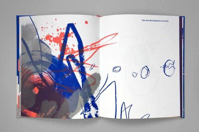 Book with abstract, colorful strokes and lines across two pages.